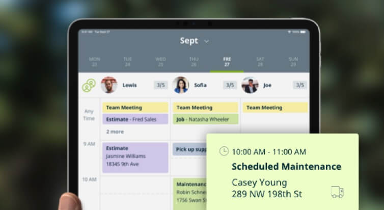 An iPad with the Jobber app open, showing a schedule alert.