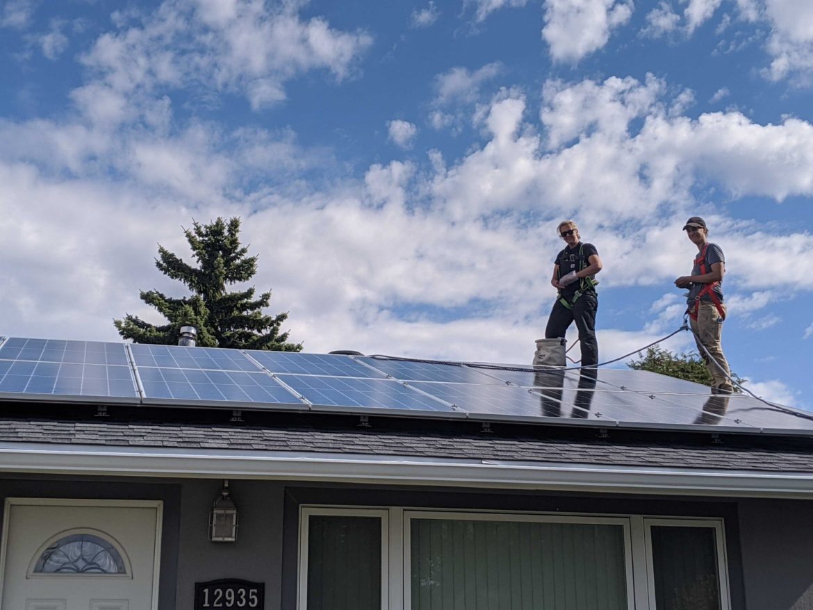 image of Kite Electric team installing solar panels